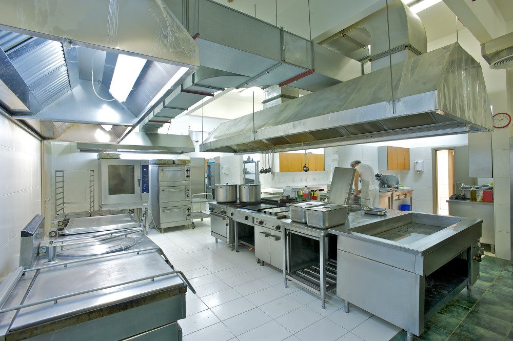 Commercial kitchen exhaust hood cleaning